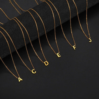 Collier pendentif lettre initiale solitaire