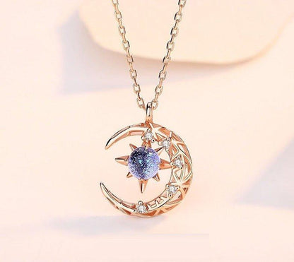 Collier pendentif lune et étoile avec cristal bleu et strass