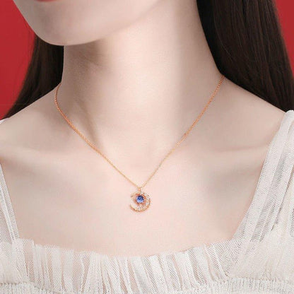 Collier pendentif lune et étoile avec cristal bleu et strass