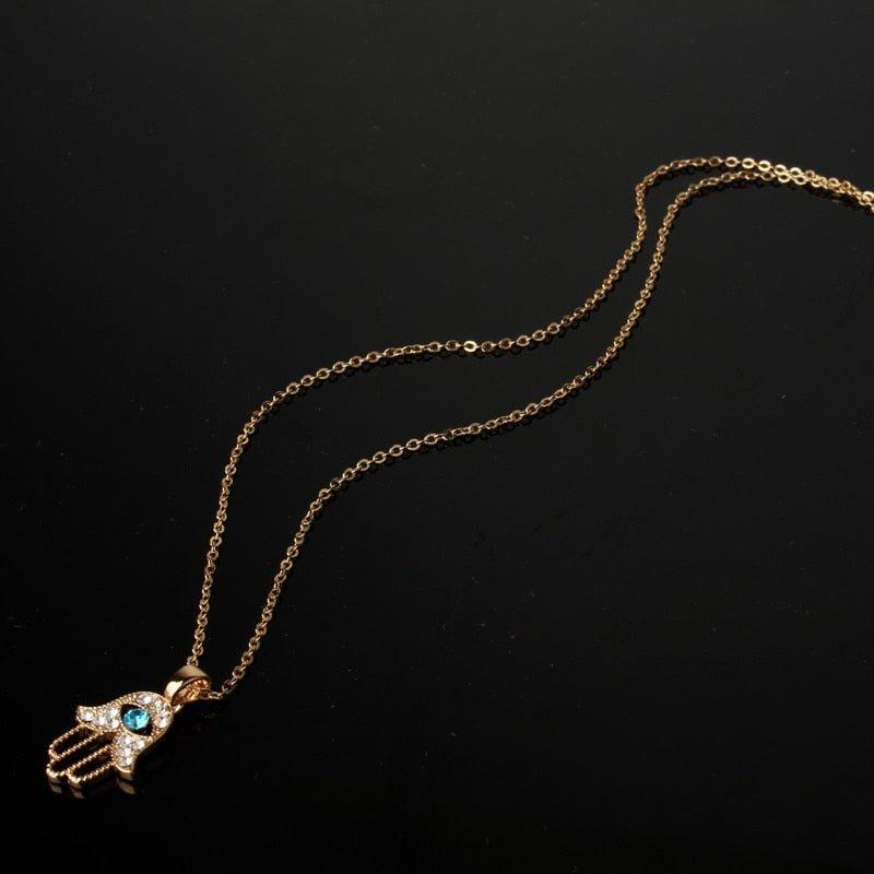 Collier pendentif main de fatma cristaux plaqué or / argent