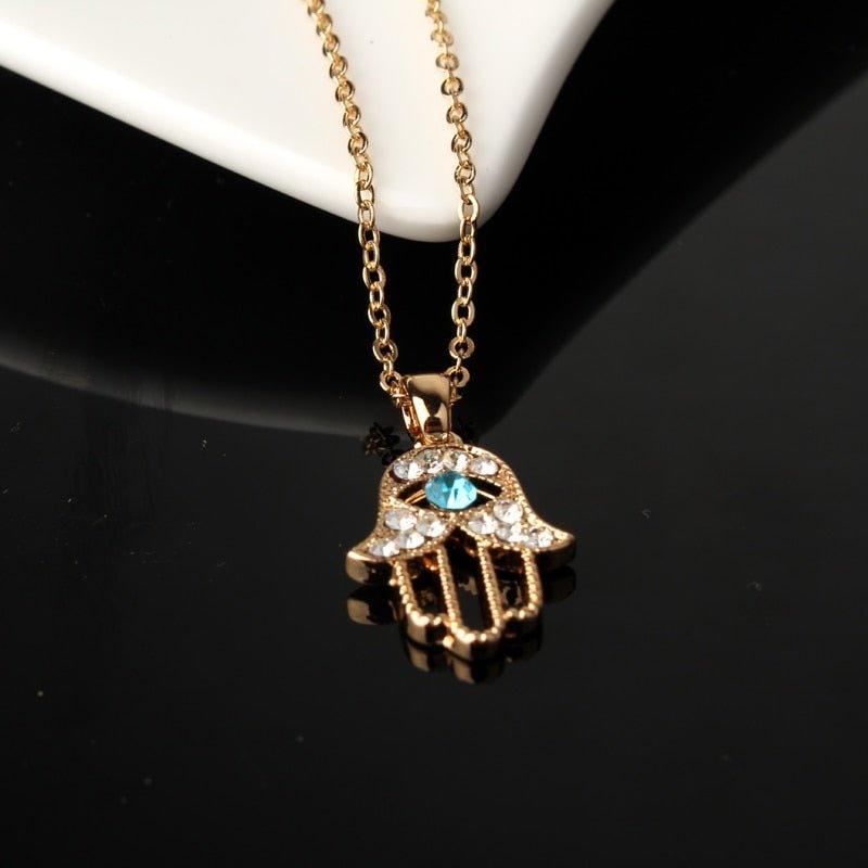 Collier pendentif main de fatma cristaux plaqué or / argent