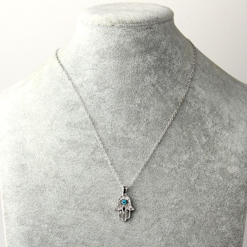 Collier pendentif main de fatma cristaux plaqué or / argent