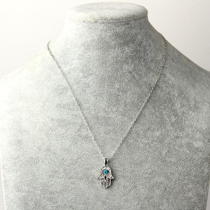 Collier pendentif main de fatma cristaux plaqué or / argent