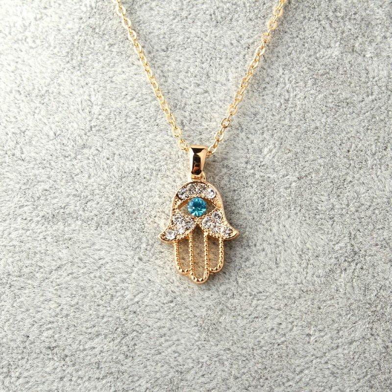 Collier pendentif main de fatma cristaux plaqué or / argent