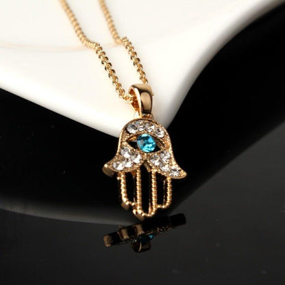 Collier pendentif main de fatma cristaux plaqué or / argent