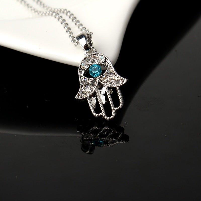 Collier pendentif main de fatma cristaux plaqué or / argent