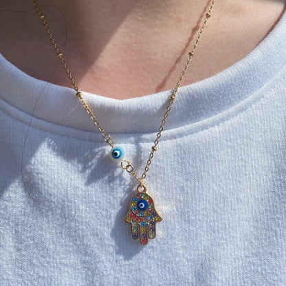 Collier pendentif main de fatma oeil plaqué or / argent