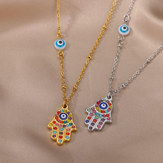 Collier pendentif main de fatma oeil plaqué or / argent