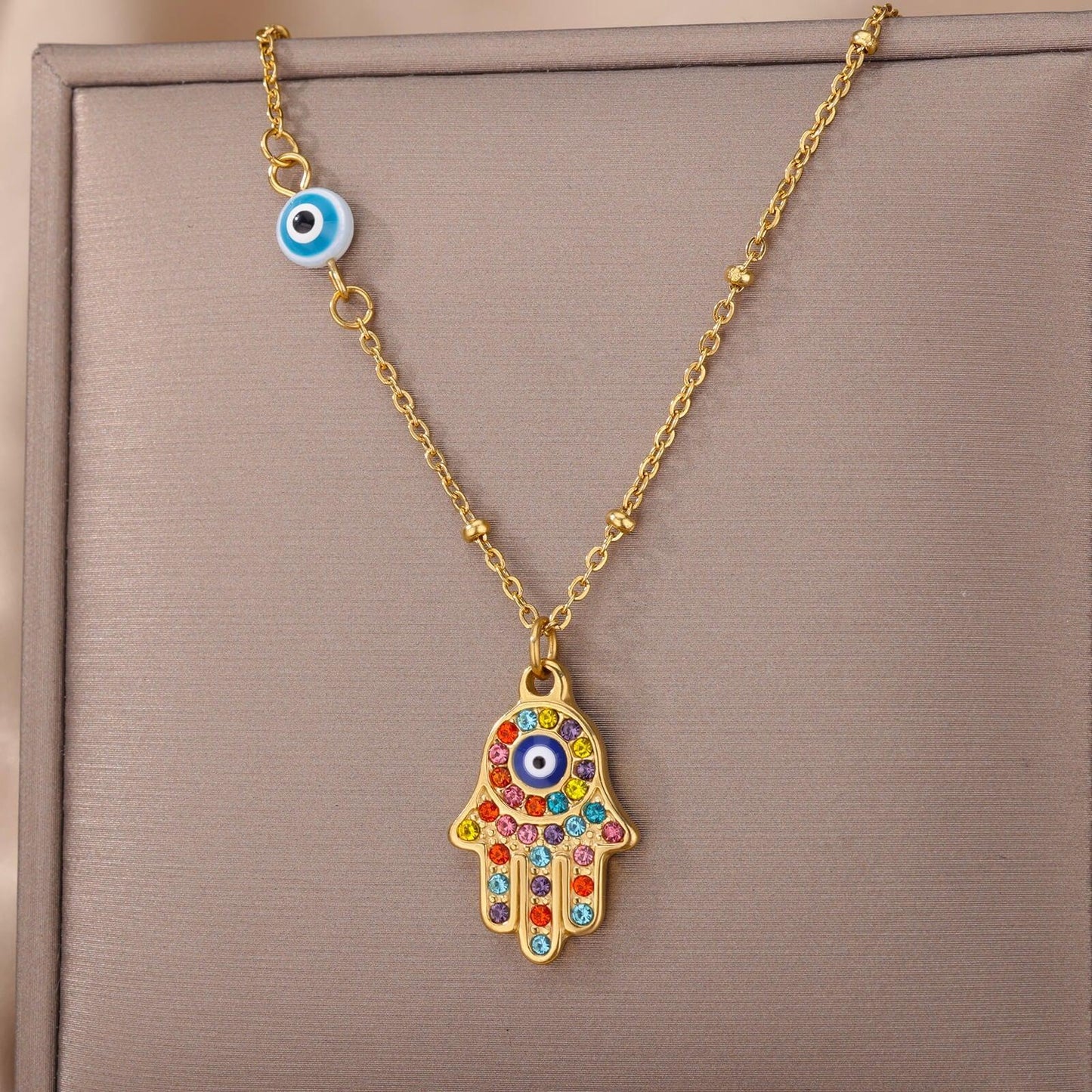 Collier pendentif main de fatma oeil plaqué or / argent