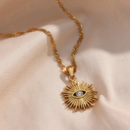 Collier pendentif oeil avec rayons vintage plaqué or