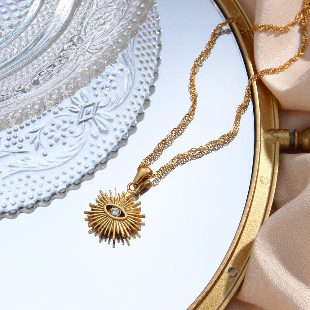 Collier pendentif oeil avec rayons vintage plaqué or