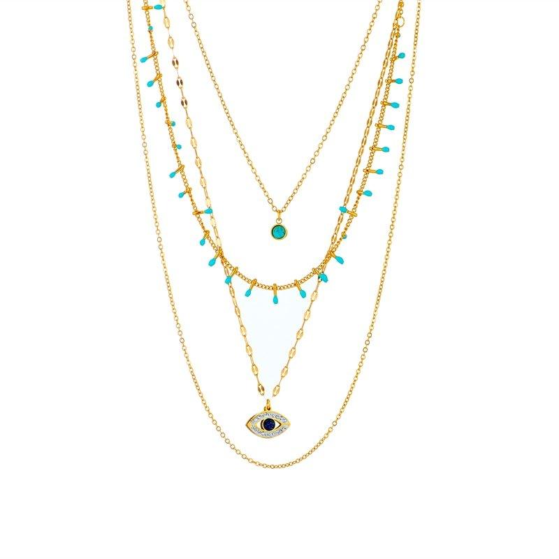 Collier pendentif œil bleu bohémien pierres vertes or plaqué