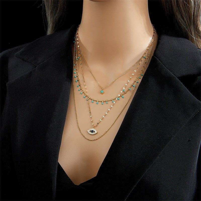 Collier pendentif œil bleu bohémien pierres vertes or plaqué