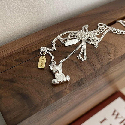 Collier pendentif ourson au repos plaqué argent