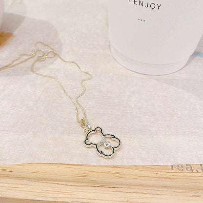 Collier pendentif ourson creux en or 14k