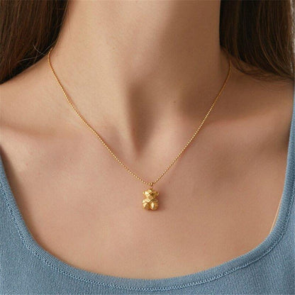 Collier pendentif ourson géométrique mini palqué or