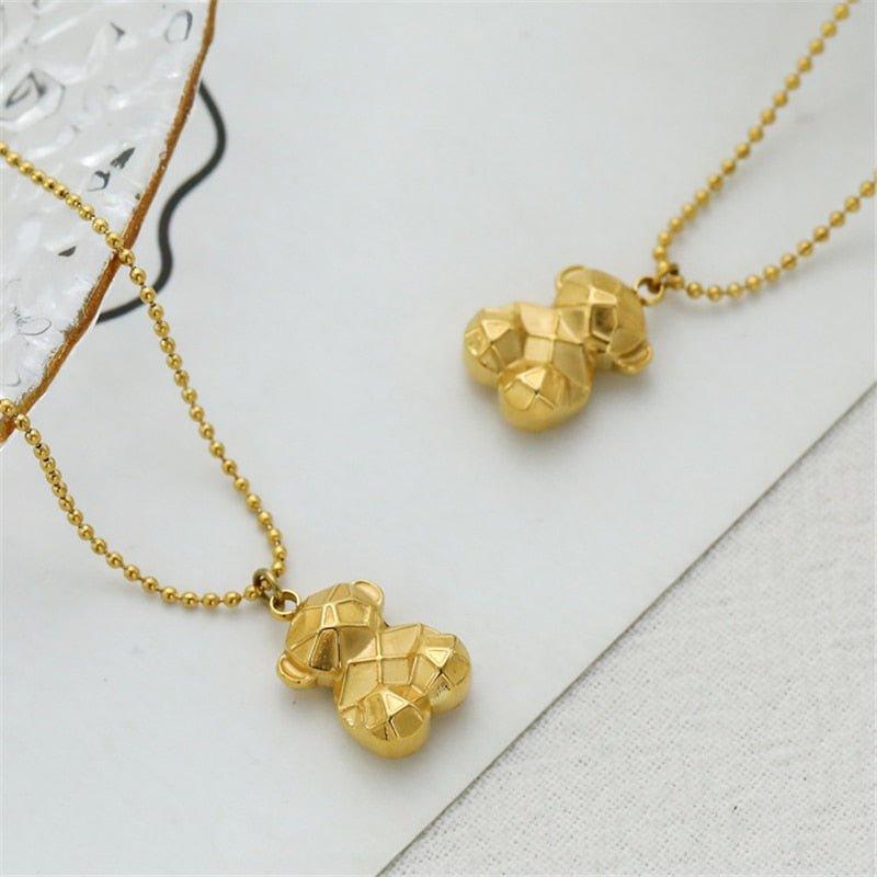 Collier pendentif ourson géométrique mini palqué or