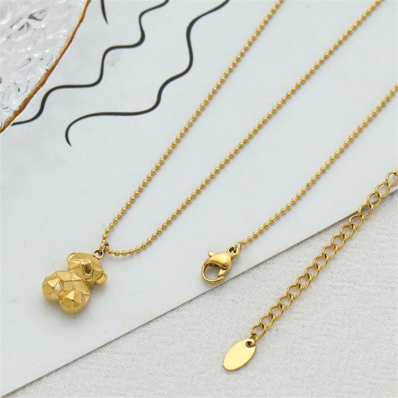 Collier pendentif ourson géométrique mini palqué or