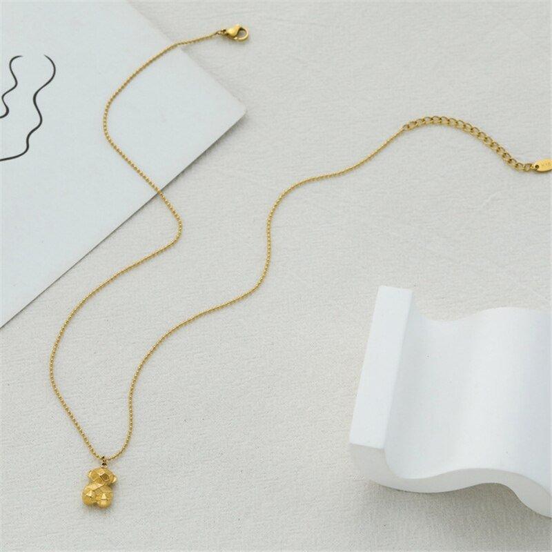 Collier pendentif ourson géométrique mini palqué or