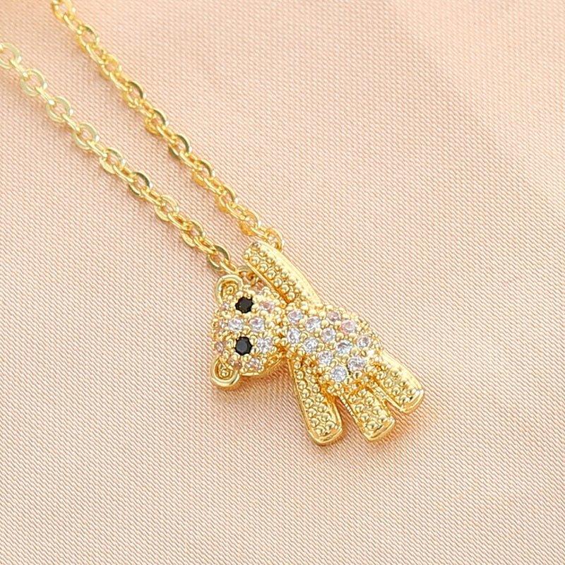 Collier pendentif ourson incrusté de pierres