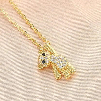 Collier pendentif ourson incrusté de pierres