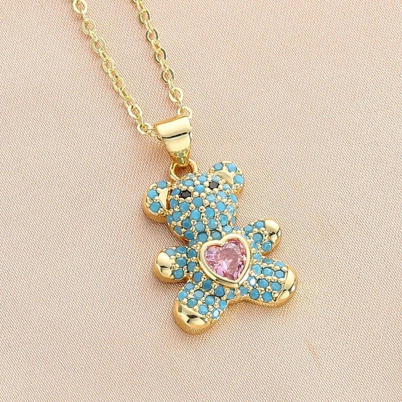 Collier pendentif ourson incrusté de pierres