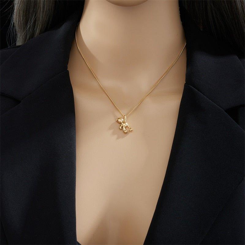 Collier pendentif ourson suspendu plaqué or