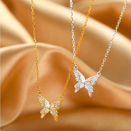 Collier pendentif papillon incrusté de strass plaqué or / argent