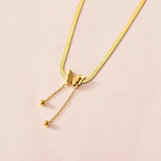 Collier pendentif papillon vintage plaqué or