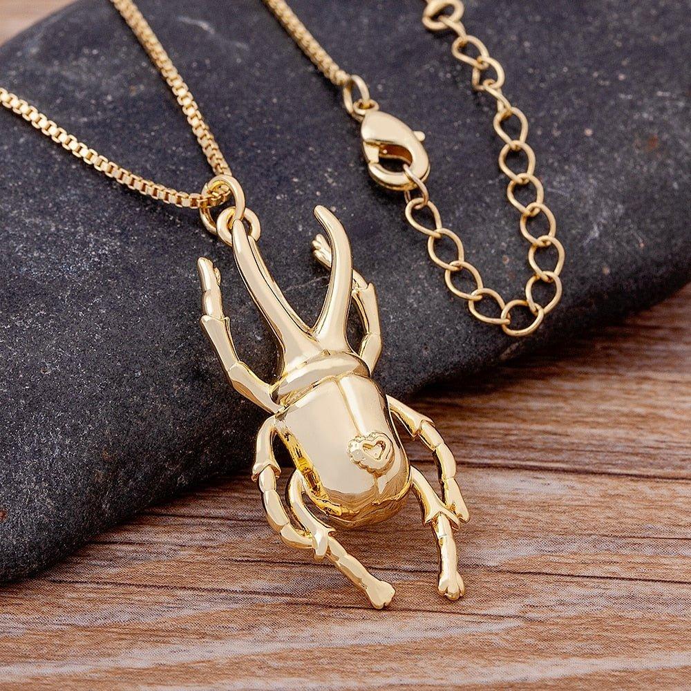Collier pendentif scarabée long pates