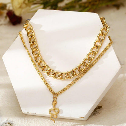Collier pendentif serpent double chaîne épaisse