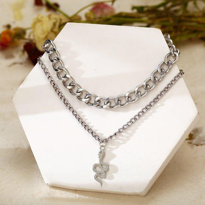 Collier pendentif serpent double chaîne épaisse