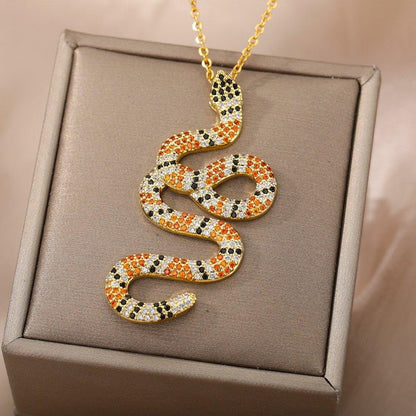Collier pendentif serpent vintage strass plaqué or