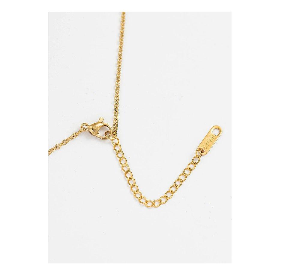 Collier pendentif soleil irrégulier creux plaqué or