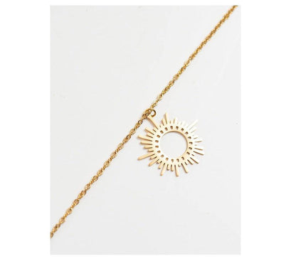Collier pendentif soleil irrégulier creux plaqué or