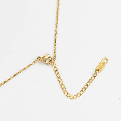 Collier pendentif soleil irrégulier creux plaqué or