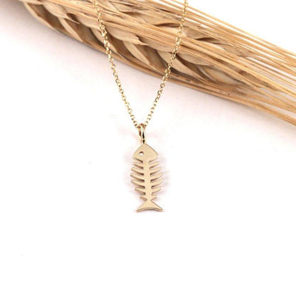 Collier pendentif squelette de poisson en plaqué or / argent / or rose