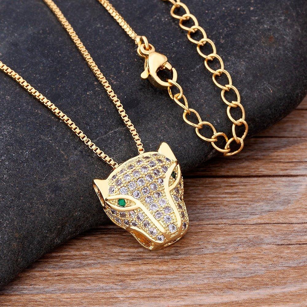 Collier pendentif tête de panthère en strass plaqué or