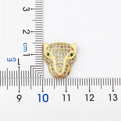 Collier pendentif tête de panthère en strass plaqué or