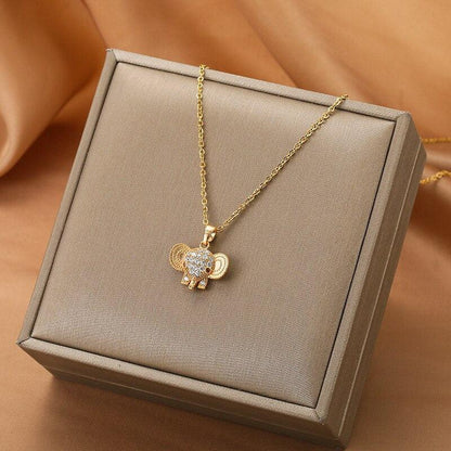 Collier pendentif tête éléphant strass plaqué or