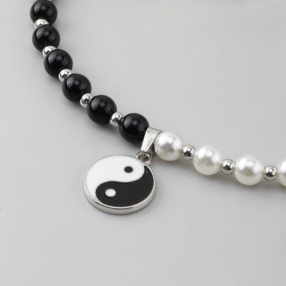 Collier pendentif yin yang noir et blanc collier perles ras de cou
