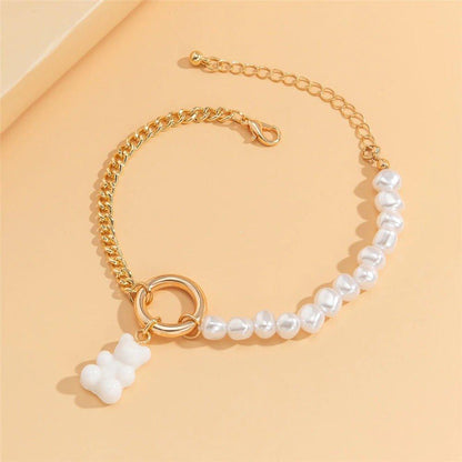 Collier perlé et pendentif ourson blanc