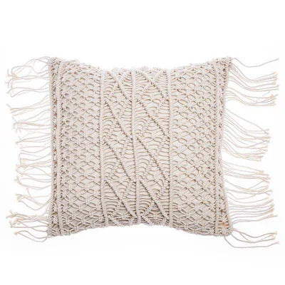 Coussin au crochet blanc avec broderie et franges