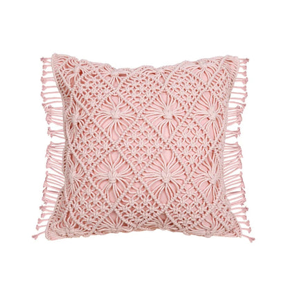 Coussin au crochet bohème avec motifs géométriques sur fond blanc