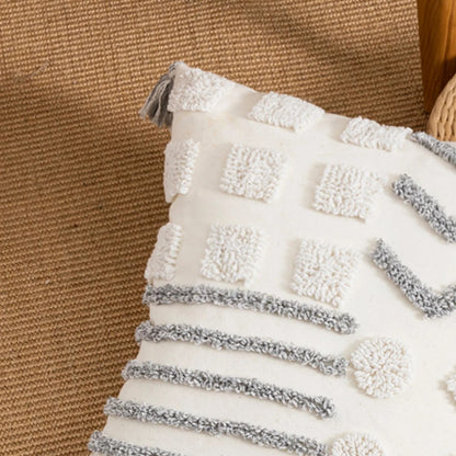 Coussin déco pour canapé avec motifs géométriques
