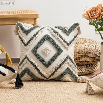 Coussin design vert avec losanges brodés