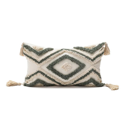 Coussin deisgn vert avec losanges brodés