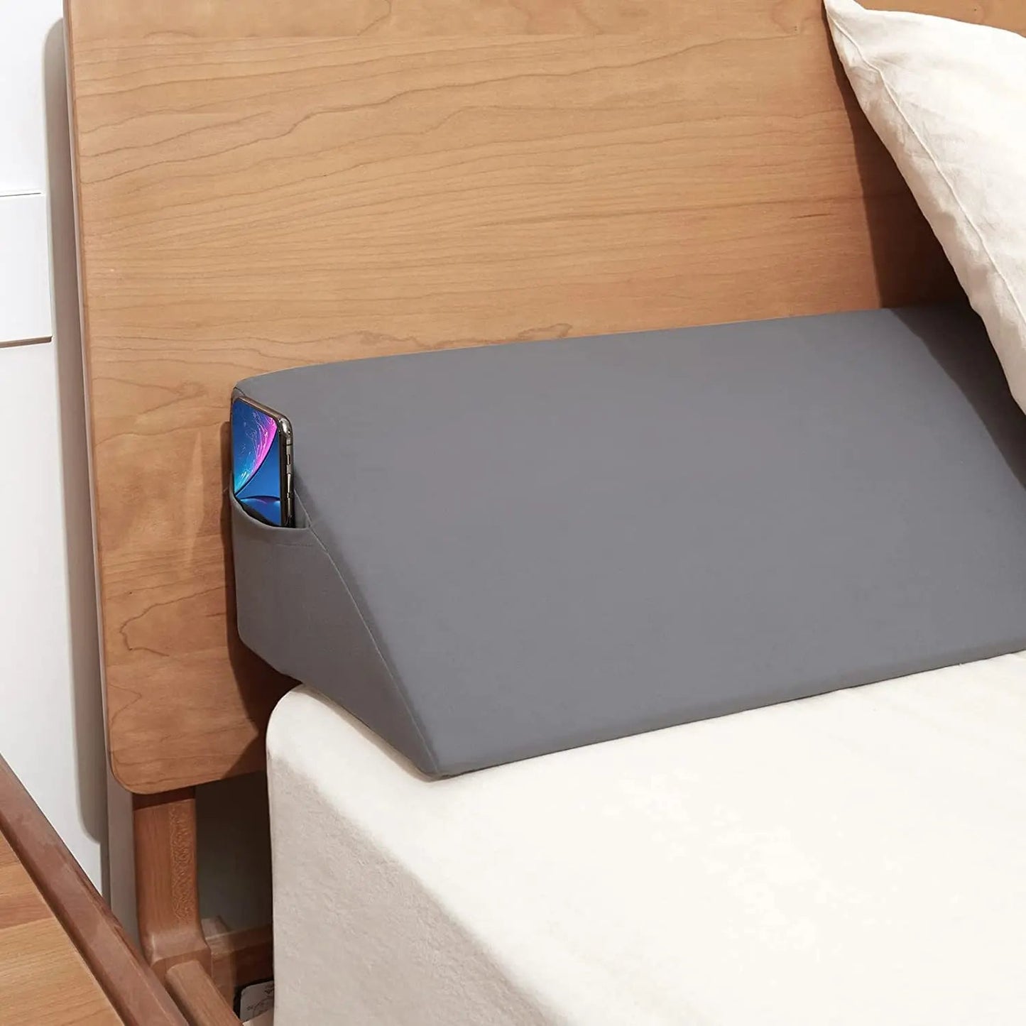 Coussin de positionnement pour dormir avec poche de rangement