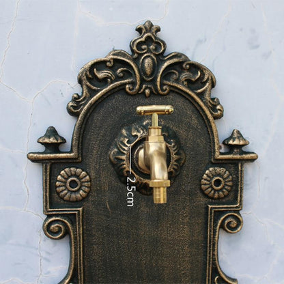 Fontaine murale en fonte