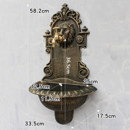 Fontaine murale tête de lion